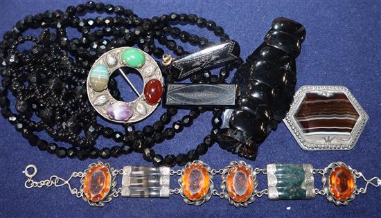 A jet bracelet, Scottish hardstone bracelet, two other hardstone brooches and other items.